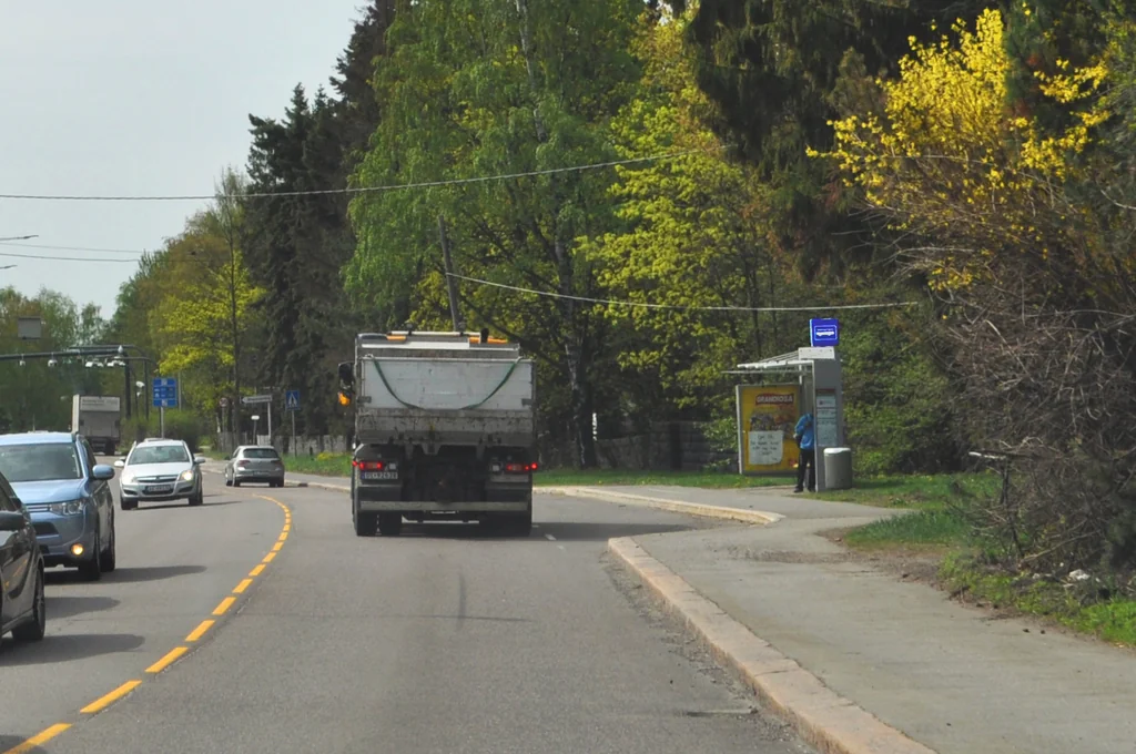 Note that the sign itself is usually located by the bus shelter